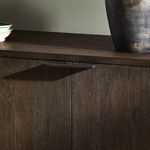 Corner detail showing rubbed black oak wood surface and black metal frame