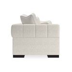 Side view showing channel quilting on armrest and back with contrasting cushion piping