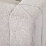 Detailed view of channeling and fabric seam on wide armrest corner