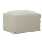 Back center view of slipcover ottoman with soft rounded edges and skirted slipcover