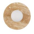 Front-facing travertine disc with centered frosted globe seen in soft studio lighting