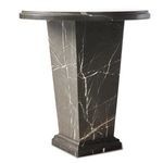Close angled view of Eslo End Table highlighting side base veining and edge detail of round marble top