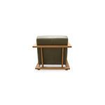Rear view of Eckersley Lounge Chair featuring vertical oak supports and leather back cushion