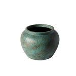 Top-down angle showing open mouth and inner black interior of turquoise anchor jar