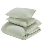 Folded sage green duvet and two pillow shams stacked against a white background