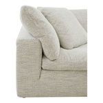 Close-up of armrest and overlapping back cushions showing textured fabric
