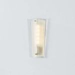 Baxford Wall Sconce lit, with soft glowing light through folded etched glass