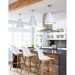 Close-up of white cone shade with brass rivets on French Maid Small Chandelier showing clean matte finish