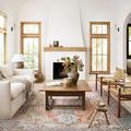 Loren rug styled under wooden coffee table in bright white living room with natural light