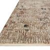 Angled side view highlighting the low pile texture and neatly finished edges of the Leigh Ivory Multi Rug