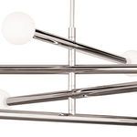Side view showing the intersection and joint details of the chandelier’s polished metal arms