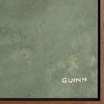 Detail close-up of bottom right corner showing artist signature 'GUINN' on textured green surface