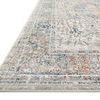 Low-angle side view highlighting thin profile and detailed border of the Bianca Stone Multi Rug