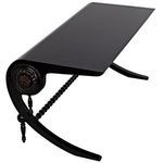 Opposite side angle of desk with focus on carved floral detail and turned legs from a low viewpoint