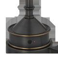 Close-up of lamp base with power button illuminated red indicating on status