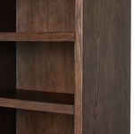 Close-up of middle shelves showing thick plank shelves with dark oak finish and smooth edges