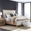 Form King Bed in a modern bedroom with dark walls, large windows, and neutral decor including a nightstand and poufs
