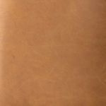 Close-up showing the fine leather grain texture and natural markings