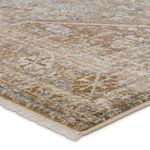 Close-up corner with detailed pile texture and colors in tan and gray tones