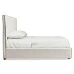Sawyer Storage Panel Bed side view highlighting tall upholstered headboard with flanged edges