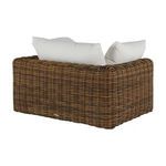 Back and side angled view of Montecito Woven Lounge showing rounded rattan wicker edges and cushion placement