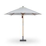 Side view of Baska umbrella with cream canopy fully open
