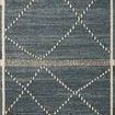 Charcoal rug with two-tone greige diamond Moroccan motifs and subtle high-low texture