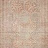 Traditional Jules Tangerine Mist rug with muted orange and blue geometric medallion pattern and detailed border