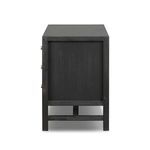 Side elevation of the nightstand displaying wood grain texture and frame construction