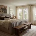 Polly Cream Sand Rug under bed in bright bedroom with large windows and neutral bedding