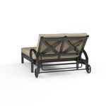 Rear view showing metal cross back support structure and wheels on Monterey Double Chaise