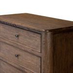 Top side angle highlighting rounded edges and natural oak grain finish