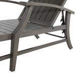 Side view of chaise with white cushion and curved armrest, backrest partially reclined