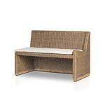 Close-up of tight rattan weave along the arm and side of Senna Woven Dining Bench