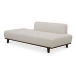 Another angled view from opposite corner showing upholstery texture and wooden legs