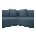 Close-up of corner joint with two matching blue cushions highlighting smooth fabric texture