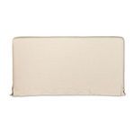 Back view of cream linen upholstered headboard with slipcover