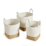 Three Madura Market baskets turned to show solid white woven sides with natural color bottoms