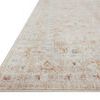 Low angled view revealing rug texture and subtle gradation of colors along edge.