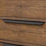 Top view of dresser showing plank wood texture on the rustic sandalwood finish
