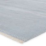 Close-up showing plush dense pile with texture detail and ivory fringe trim at edge