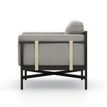 Hearst Outdoor Chair side view focusing on armrest and strap detailing