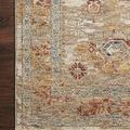 Top view of Gaia Gold Taupe rug corner on dark wood floor highlighting edge finish and color contrast in border.