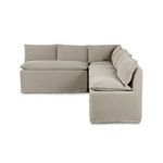 Side profile of the banquette highlighting the thick seat cushion and relaxed pillow backs