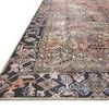 Close-up angled view showing low pile texture and detailed border pattern of the Jules terracotta rug