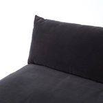 Rear view of Grant sectional armless piece showing smooth fabric upholstery and base feet