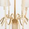 Close-up of woven abaca wrapped around the base center pole and surrounding metal arms.