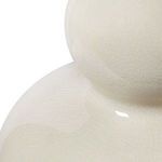 Close-up of crackled glaze texture on the Devon Sand Dollar Lamp's ceramic base showing delicate fissures under glossy finish