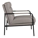 Verlaine chair side profile emphasizing seat thickness and armrest leather detail