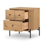 Nightstand drawer detail showing handles and natural wood grain texture